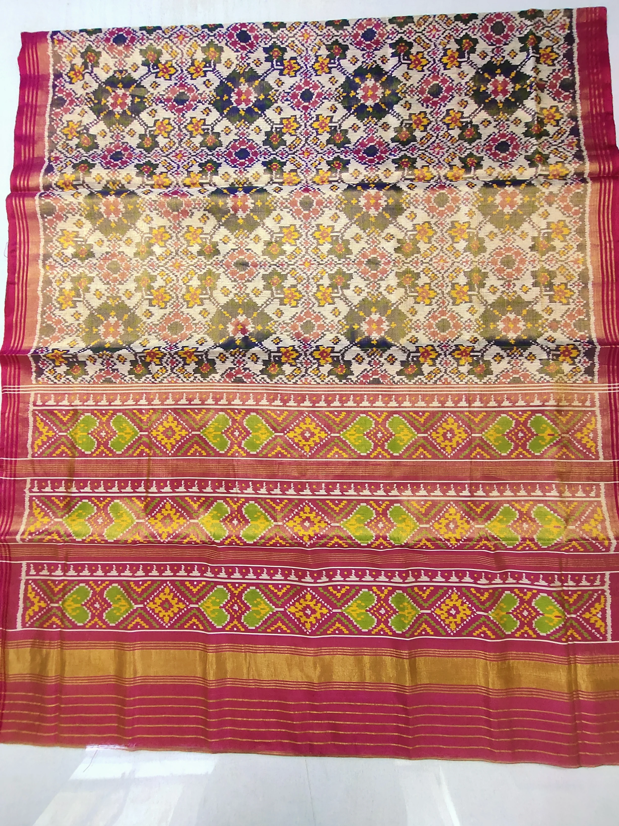 Tissue Patola Saree – Blue & White Base | Reddish Pink Selari Pallu | Navratan Motifs