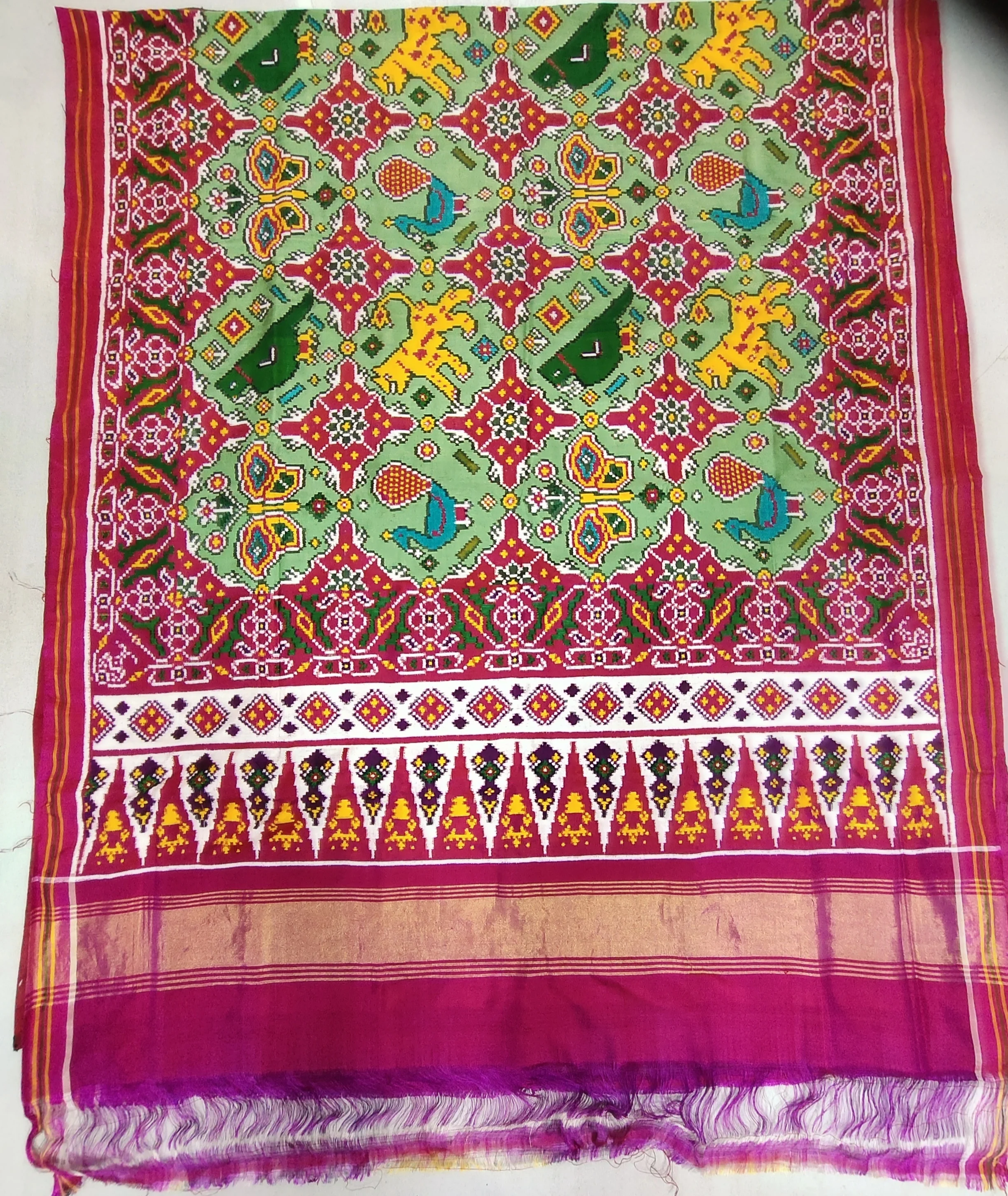 Double Ikat Patola Saree – Pista Base | Pink Border | Triful Motifs | Big Animal Motifs