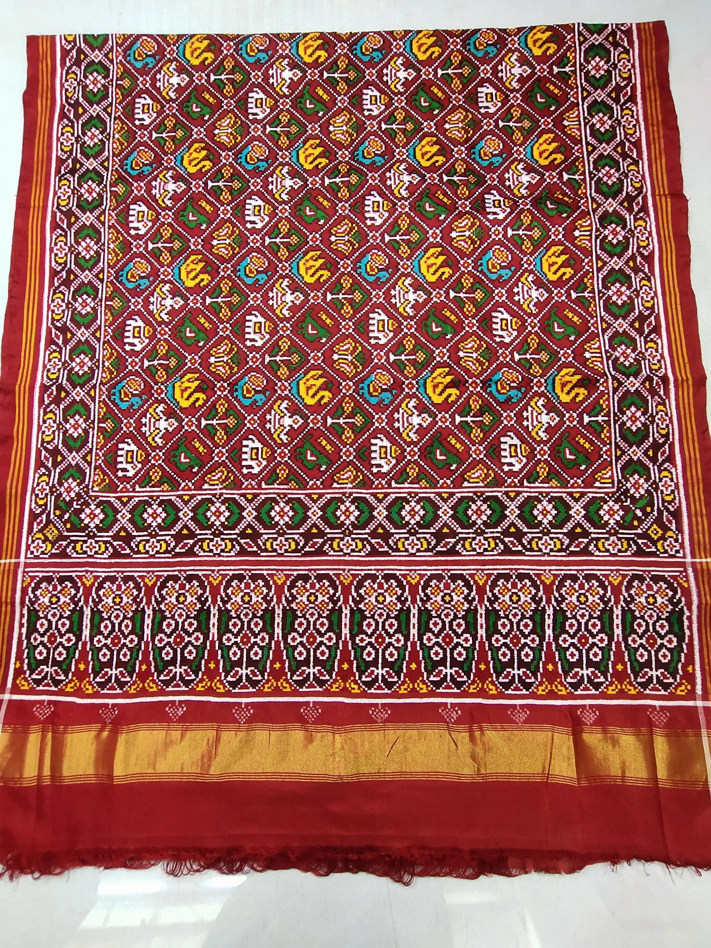 Red marron Nanu Narikunj Motifs Double ikat Patola Saree